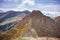 Dangerous mountains - steep and narrow path on a ridge to rocky summit of Rohacz Ostry