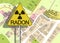 Dangerous radon gas in the underground of the city - concept with an imaginary General Urban Plan with symbol of radioactivity on