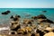 Dangerous rocks and reefs near beach in Pissouri bay, Cyprus
