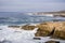 Dangerous surf crushing on the rugged cliffs of Montana de Oro State Park, San Luis Obispo county, California