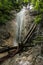 Dangerous trail through a waterfall with steel ladders in the Slovak Paradise National Park, Slovaki