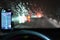 Dangerous winter season with snow on the road. The interior of the car from the driver`s point of view - dangerous evening traffi