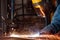 Dangerous work weld with sparks welding process.