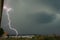 Dangerously close daytime lightningbolt hits the earth in the Mures valley in Transylvania, Romania