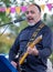 Daniel Jonas of 3yin singing and playing guitar at an annual concert of Jewish Klezmer music in Regent`s Park in London UK.