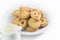 Danish cookies on dish with milk isolated