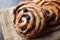 Danish Spiral Cinnamon Raisin Roll / German Pastry Schnecken on Sack.