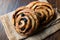 Danish Spiral Cinnamon Raisin Roll / German Pastry Schnecken on Sack.