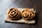 Danish Spiral Cinnamon Raisin Roll / German Pastry Schnecken on Sack.