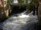 Danish waterway sluice with gushing water