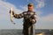 Danube Delta fisherman proudly showing his catch of the day