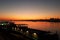 Danube river at sunrise with ships at shore in Giurgiu