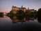 Danube river sunset mirror reflection of medieval fortress castle Schloss Sigmaringen in Baden-Wuerttemberg Germany