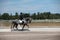 Dapple Gray Dressage Horse and Rider at a show