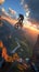 Daring mountain feat motorbike rider performs sunset stunt on rocky slope