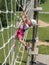 Daring Young Girl on Obstacle Course