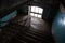 Dark abandoned stairway interior in old living house