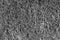 Dark abstract background and pattern of interwoven hairs, fibers and nanofibers. Sponge detail texture, sponge texture closeup