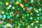 Dark abstract green, red, yellow, turquoise glitter background christmas tree-abstract background