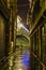 Dark alley in Venice with Rialto Bridge