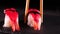 On a dark background on a tray, cooked or purchased sushi Nigiri taste Chinese chopsticks. Concept of: Nigiri, Sushi of the Day,