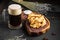 Dark beer and mini fried meat pies chebureks