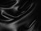 Dark black glossy luxury silk cloth background