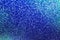 Dark blue colored glitter abstract background