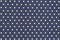 Dark blue denim with yellow polka dot fabric background