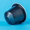 Dark blue espresso cup on a blue background. Modern conceptual art.