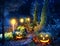 Dark blue garden patio with Jack-o-Lanterns