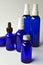 Dark blue glass bottles for cosmetic lotions, serums, oils