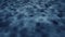 Dark blue ocean bottom surface.