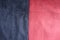 Dark blue and red artificial suede sewn together vertically