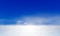 Dark blue sky Above the white clouds and the atmosphere. The sky atmosphere of the stratosphere contains a small number of stars