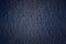 Dark blue vintage background with textured surface