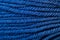 dark blue woollen thread as background