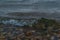 dark bright green waves of lake baikal, in overcast summer, stones, water, coast