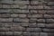 Dark broken cement brick texture