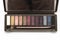 A dark brown eye shadow cosmetic palette kit