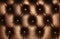 Dark brown leather capitone background texture