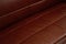 Dark Brown leather sofa, close up detail. Furniture showroom photography