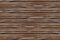 Dark brown pattern background with horizontal parallel lines ribbed texture wooden base