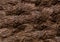 Dark brown stone uneven weathered natural background wall part grunge