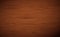 Dark brown wooden cutting, chopping board, table or floor surface. Wood texture.