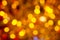 Dark brown yellow and red blurred Christmas lights