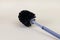 Dark brush for the toilet. Copy space - the concept of cleaning, cleanliness, household chores