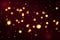Dark Burgundy abstract background with bokeh lights and stars