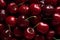Dark cherry allure, a captivating arrangement of deep red cherries