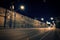 Dark Chicago street with factory warehouse scene at night.